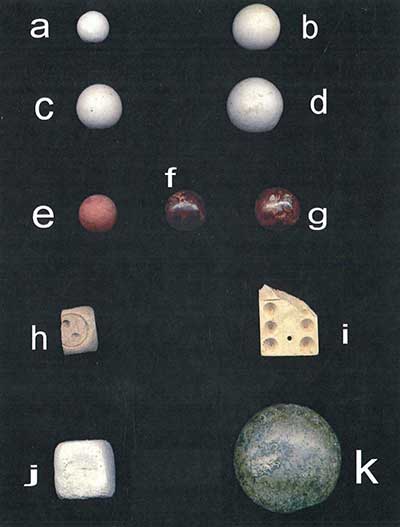 Gaming artifacts: a-g, marbles, h, die; i, domino; j, billiard chalk; k, billiard ball.