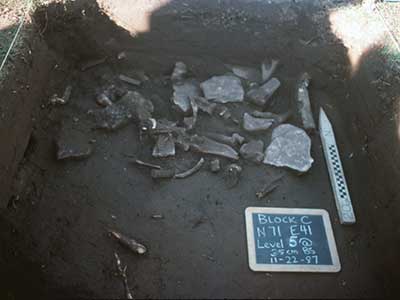 Archaeologists uncovered a cabin hearth filled with animal bones.