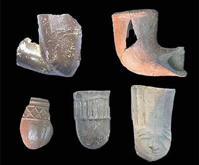 Clay tobacco pipe bowls recovered from the site.