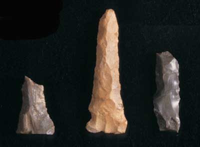 Chipped stone drills from the site.