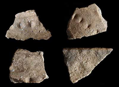 Decorated jar fragments from the site.