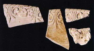 Unglazed wasters of an edge-decorated Queensware plate.