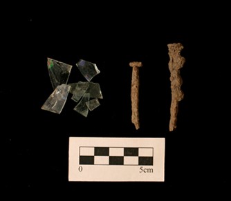 Window glass and machine-cut nails.