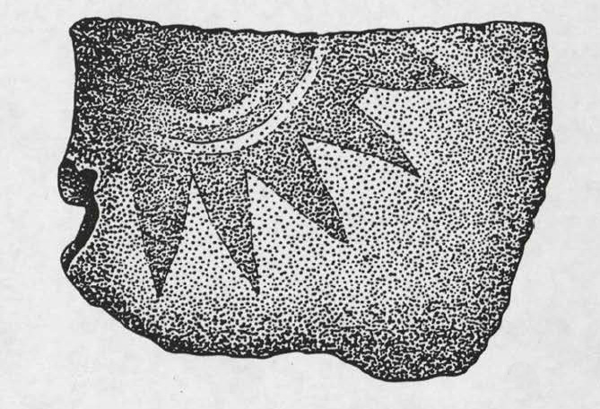 A negative painted vessel fragment with a portion of a sun symbol.