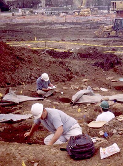 Archaeologists excavate graves at the Old Frankfort Cemetery.