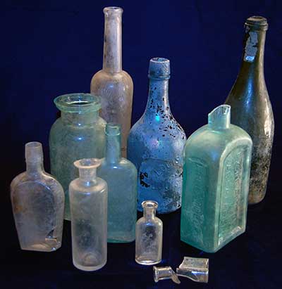 Archaeologists recovered a variety of glass bottles used and discarded by the Veit Family.