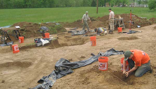 Archaeologists excavate earth ovens and trash pits at the Pierce site