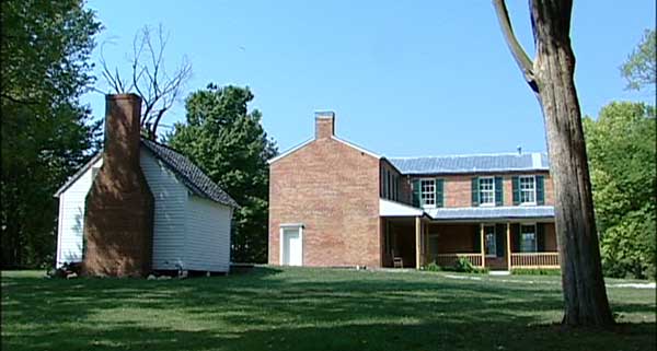Rear yard of Main house and detached kitchen.