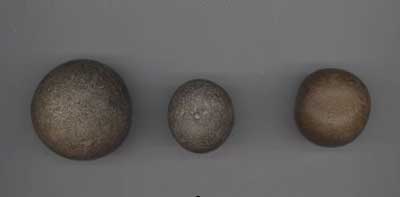 Examples of round stone balls recovered from Site 15Ru140.