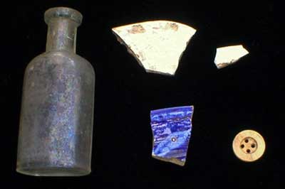Artifacts recovere​d from around the foundation remains of a house.