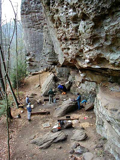 Archaeologists investigate Military Wall Rockshelter.