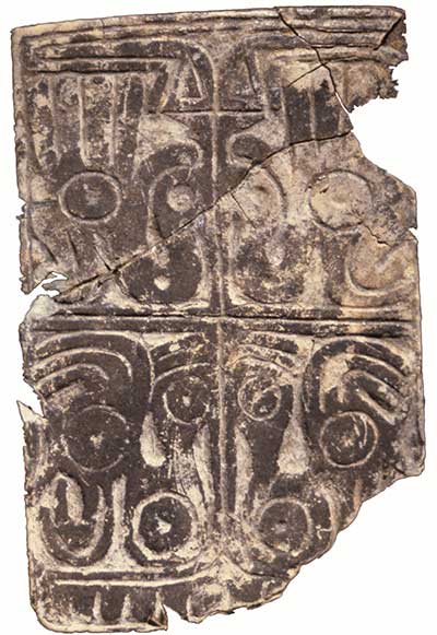 An engraved Adena tablet made from siltstone depicts stylized birds.